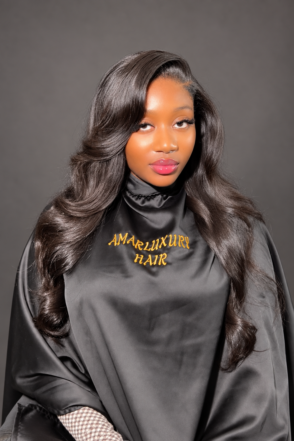 Long black layered waves styled by AmarLuxuryHair